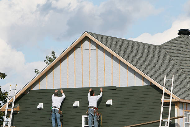 Professional Emergency Siding Repair technician working in Elliottsburg, PA